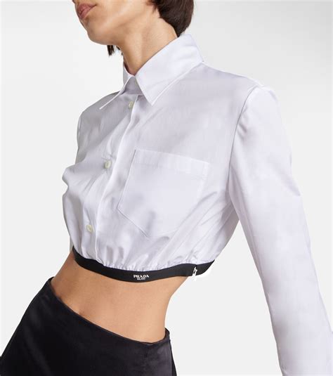 Camicia cropped in cotone in Bianco .